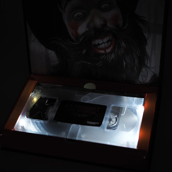 Cannibal! The Musical - Limited Edition Deluxe LED Light Up VHS (Staff Pick)